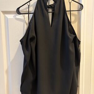 Elegant, sexy black cold shoulder top. Lined.